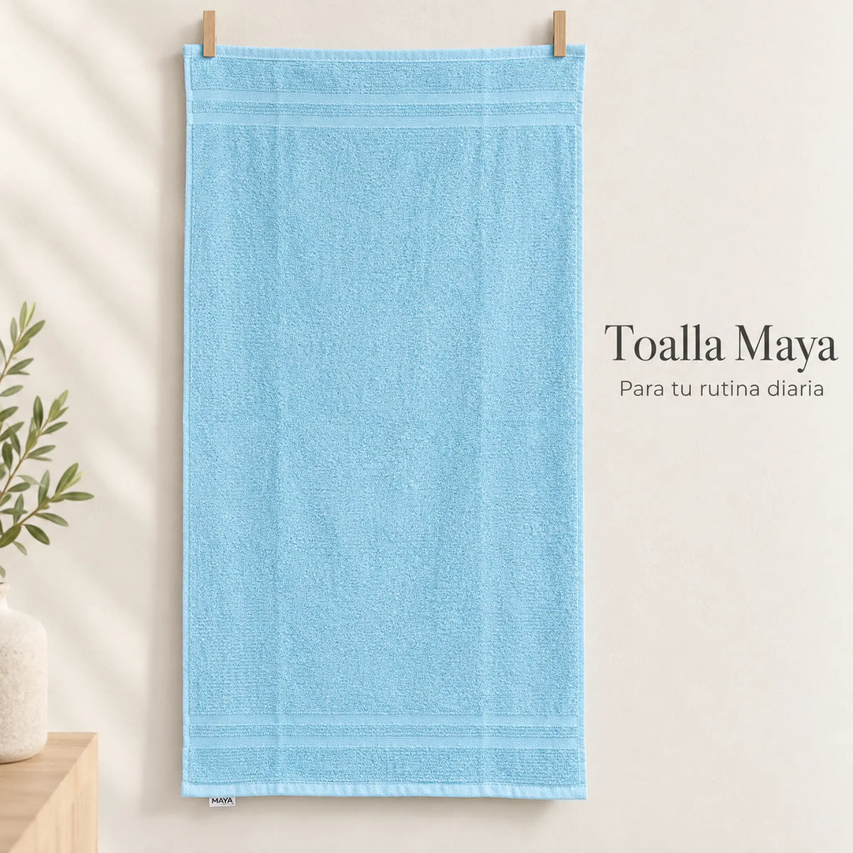 Pack de 12 Toallas Maya, variante Surtido Pastel, toalla color celeste, vista completa