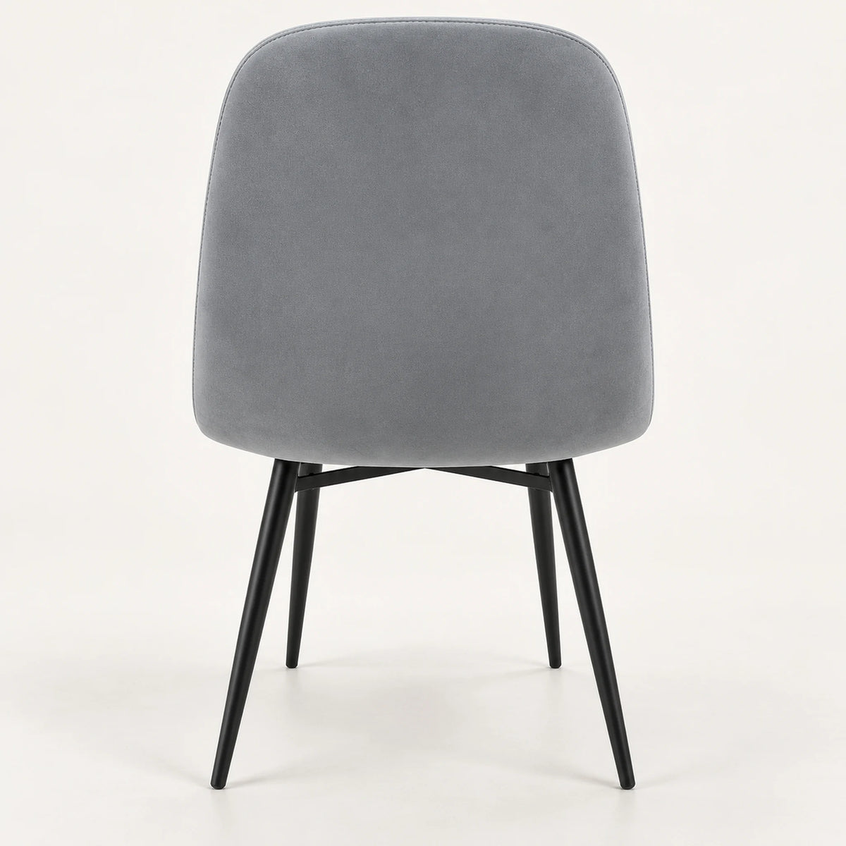 Vista trasera de la silla de comedor Beneli tapizada en gris claro