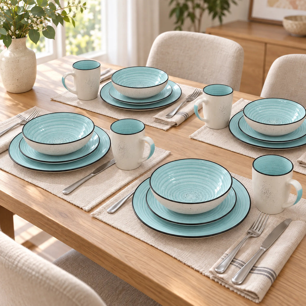 Mesa montada con la vajilla Lotus color Celeste para 4 personas