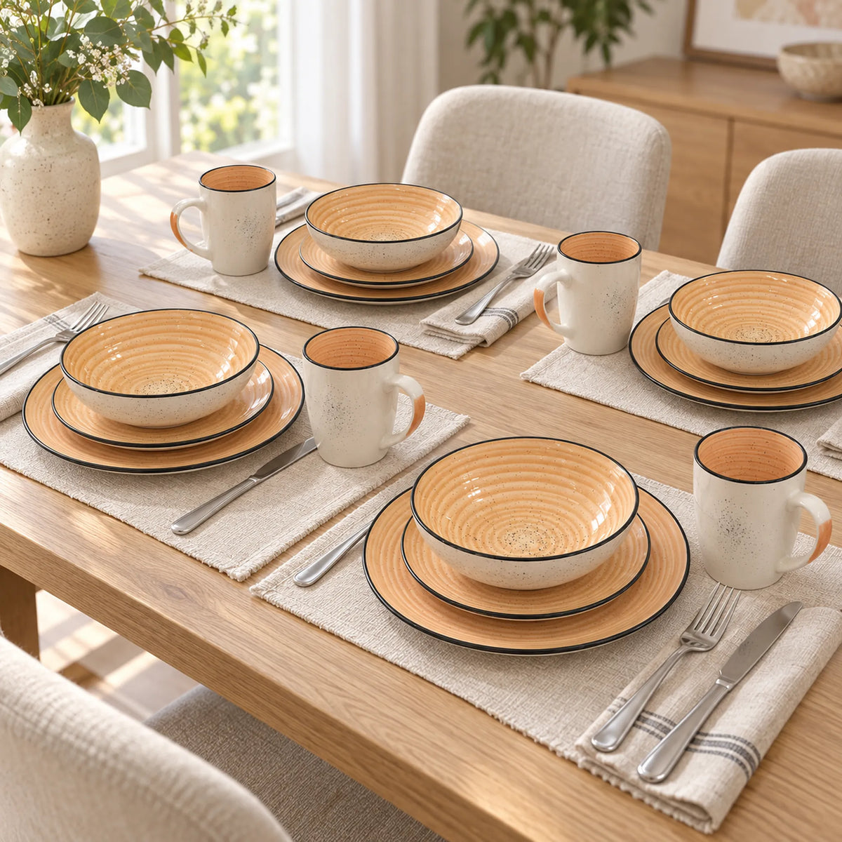 Mesa montada con la vajilla Lotus color Durazno para 4 personas