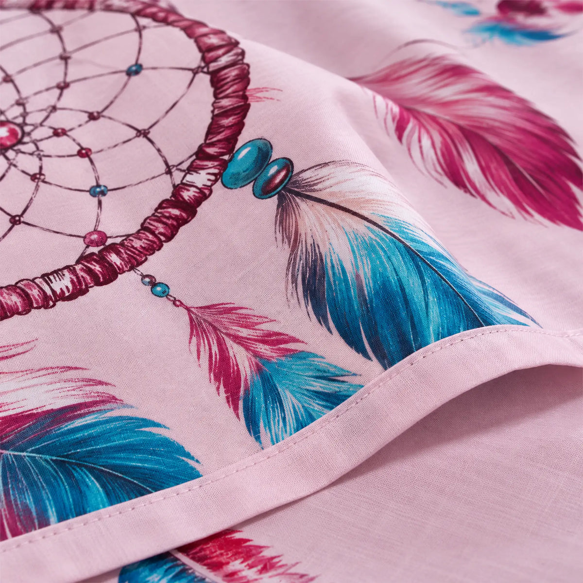 Juego de sábanas 4 piezas estampado con atrapasueños rosa – detalle de la tela