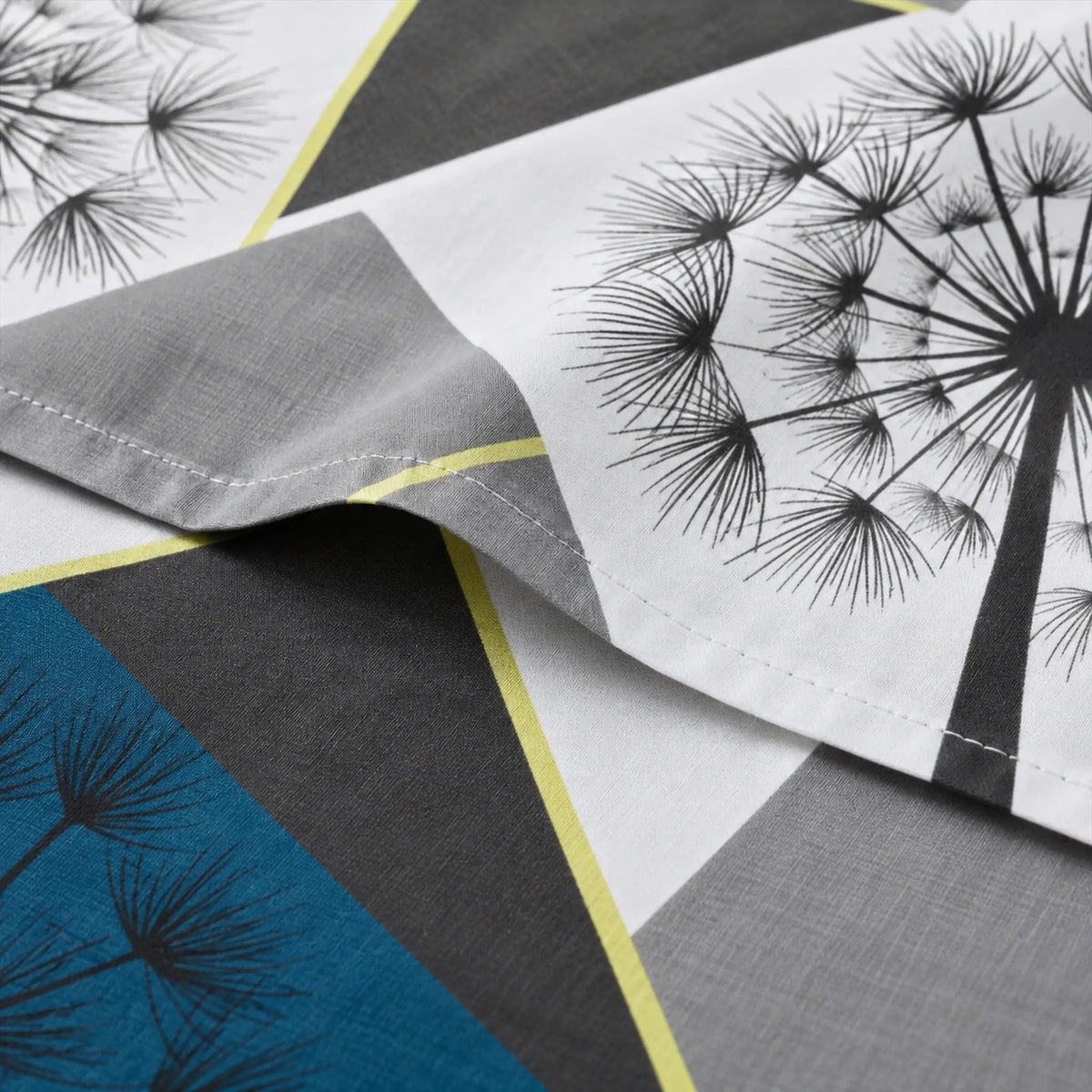 Juego de sábanas con vuelo 4 piezas, diseño Dientes de León Gris y Azul – detalle de la tela