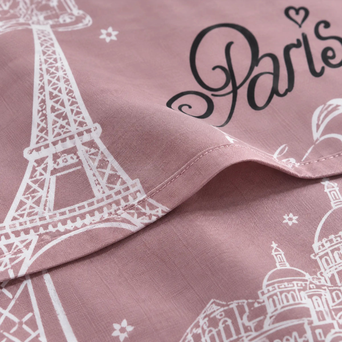 Juego de sábanas con vuelo 4 piezas, diseño París Rosa Malva – detalle de la tela