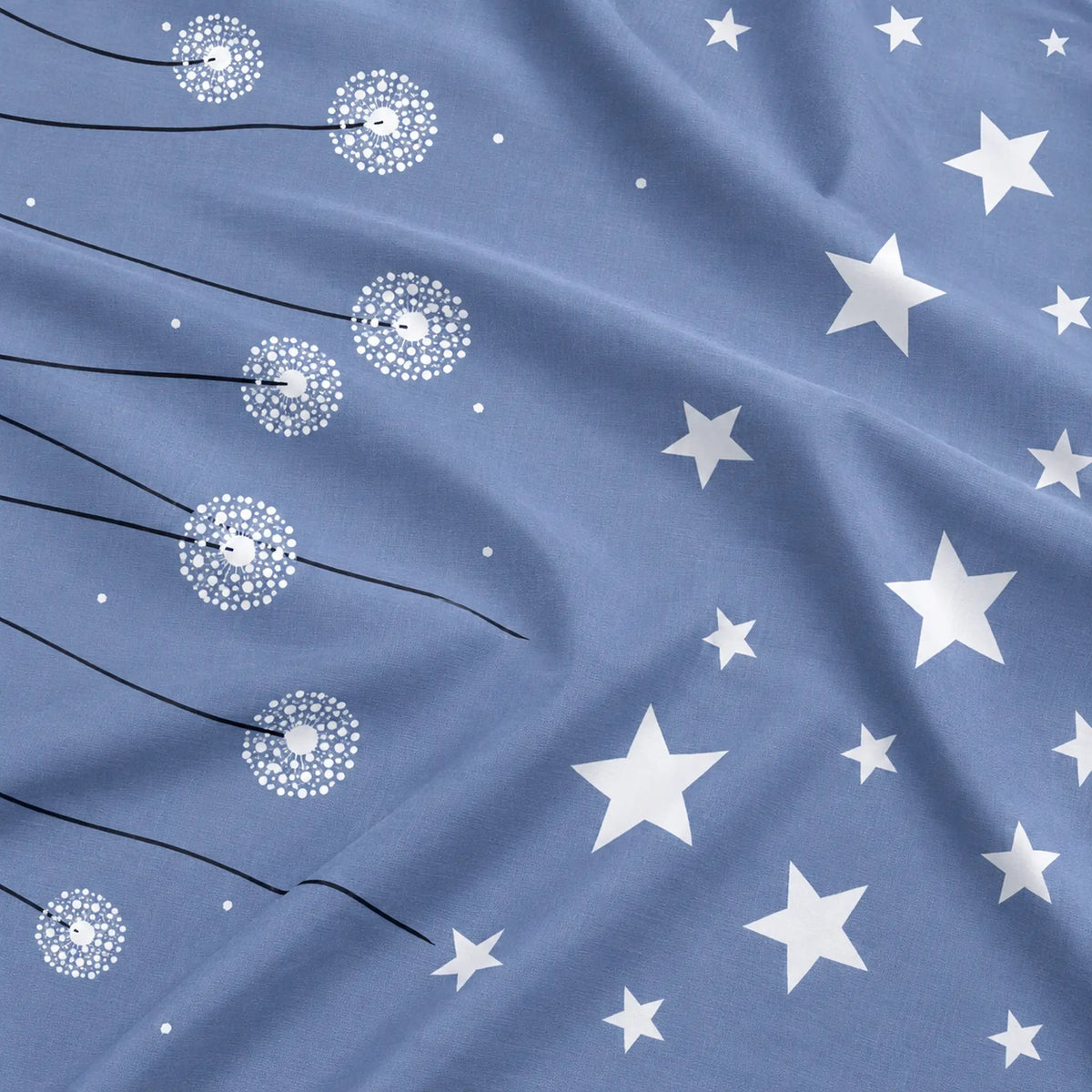 Juego de sábanas 4 piezas estampado azul con estrellas y dientes de león – detalle del estampado