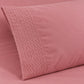 Forro ajustable liso con 2 sobrefundas bordadas, color Rosa Viejo – detalle del bordado de las sobrefundas