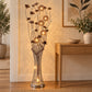 Lámpara de piso LED floral, diseño Floral Bronce – en un recibidor