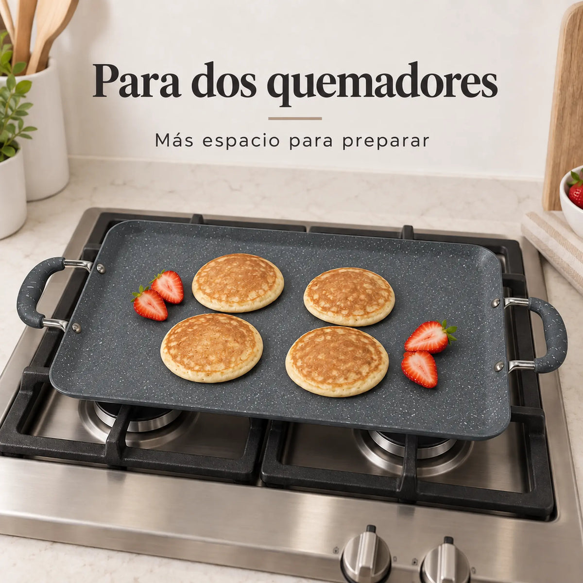 Plancha doble ROCA en uso sobre dos quemadores, color Gris Oscuro Marmoleado