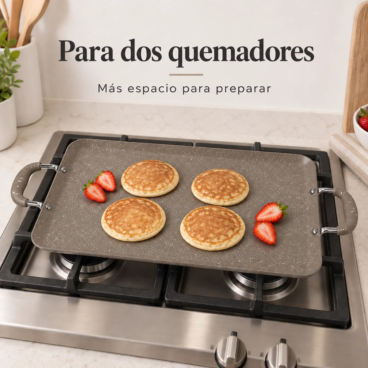 Plancha doble ROCA en uso sobre dos quemadores, color Taupe Marmoleado