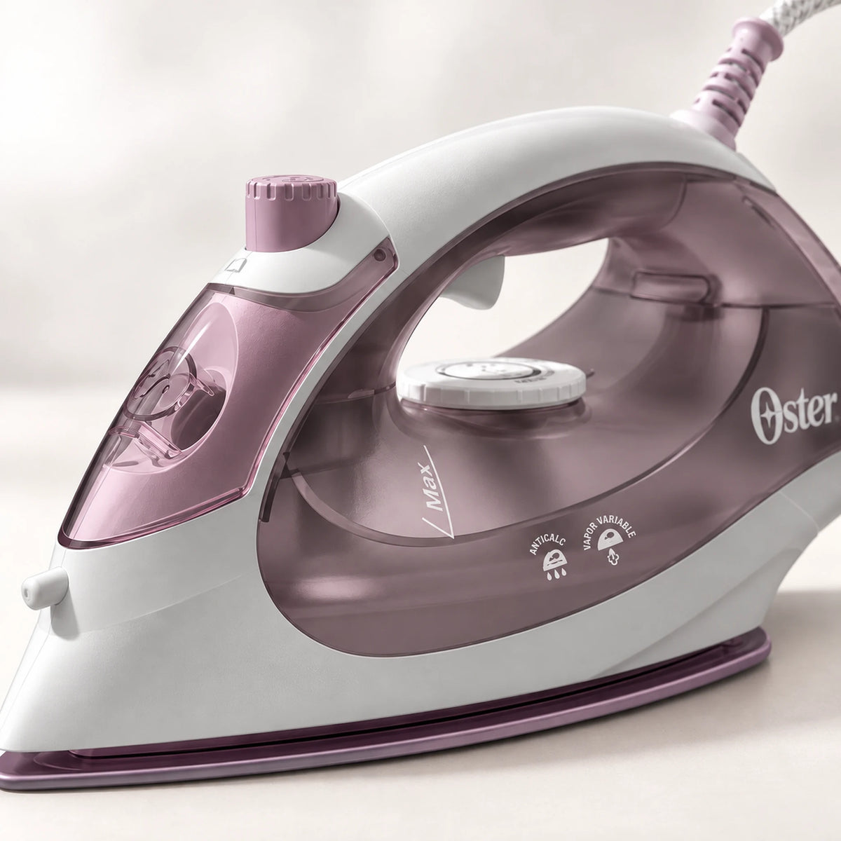 Plancha de vapor compacta rosada – acabado y mango