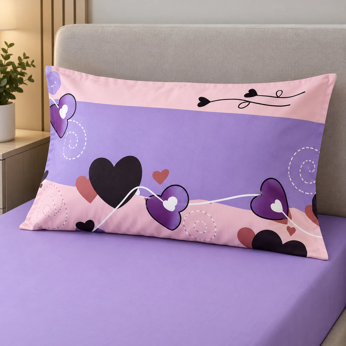 Juego de sábanas semimatrimonial 1.20 m, diseño Corazones Lila y Rosa – detalle de la funda