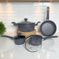 Set completo de 7 piezas Big Home con ollas y sartenes antiadherentes tipo mármol gris mate, ideal para cocina moderna.