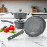Set de cocina Big Home de 5 piezas en color gris con acabado granito, mostrado en mesa frontal con verduras frescas.