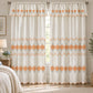 Par de cortinas bordadas satinadas con cenefa, fondo cream con bordado naranja coral – en un dormitorio