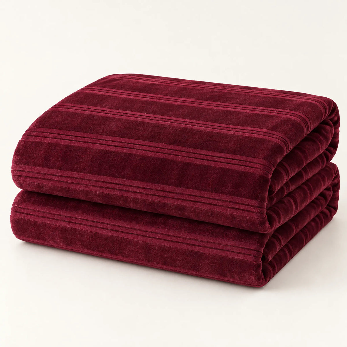 Frazada full color vino de 180 x 220 cm con rayas en relieve – doblada
