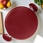 Parte inferior de la olla grande BIG Home de 24 cm, con base antideslizante en color rojo mate sobre fondo blanco.