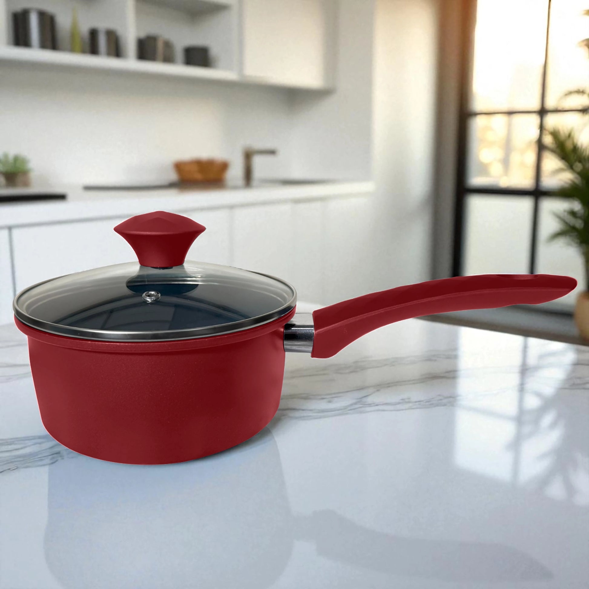 Sartén de 16 cm BIG Home con mango ergonómico y tapa de vidrio templado, acabado en tono rojo mate, capturado en ángulo lateral.