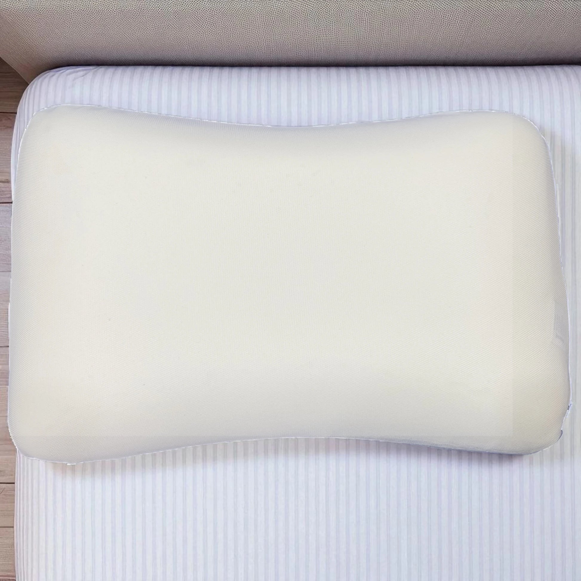 Reverso de la almohada Casa Opal 35x55 cm, funda blanca lisa, vista superior que muestra la superficie posterior del producto.