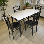Comedor 4 puestos Ambienta Home Decor DT-Y7007 con mesa rectangular 120x70 cm, cubierta tipo mármol blanco y estructura metálica negra, vista 3/4.