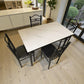 Comedor 4 puestos Ambienta Home Decor DT-Y7007, vista superior diagonal: mesa tipo mármol blanco con 4 sillas metálicas negras.
