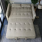 Sofá cama SFB-6096 color beige en vista lateral, mostrando el sofá y la sección extendida en modo cama durante la apertura.