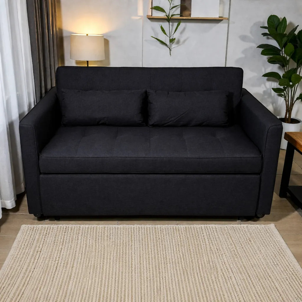 Sofá cama SFB-6097 color negro en vista frontal, modo sofá de dos plazas con cojines incluidos y acabado acolchado.