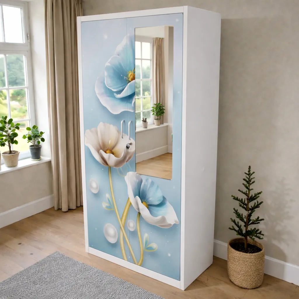 Armario con espejo de 2 puertas Ambienta Home Decor, SKU BP-2503, estructura blanca con diseño floral en tonos azul pastel y blanco con detalles dorados suaves, espejo vertical integrado, medidas 185x90x45 cm, vista frontal en ángulo.