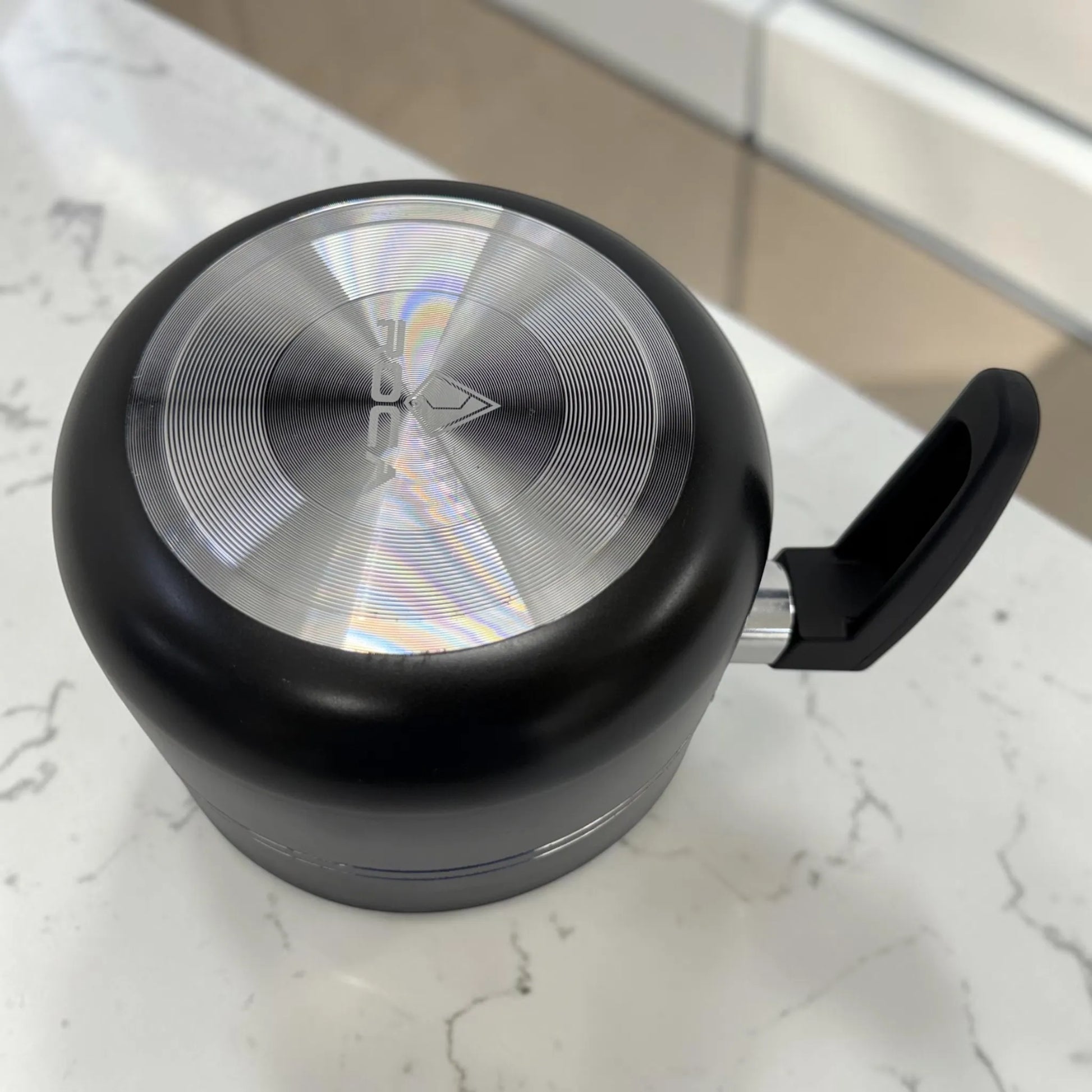 Base del lechero ROCA negro con disco difusor de calor en aluminio para cocinas de gas y eléctricas.
