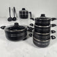 Batería de cocina ROCA negra de 12 piezas antiadherente con lechero, ollas con tapa y utensilios incluidos.