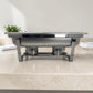 Vista lateral de chafing dish doble de acero inoxidable con dos quemadores inferiores, ideal para buffet, catering, restaurantes y eventos.