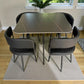 Comedor 4 personas modelo 41388 negro tipo mármol con mesa 90x90 y sillas tapizadas vista frontal