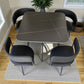 Comedor moderno 41388 negro con mesa tipo mármol para 4 personas en vista diagonal