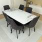 Vista izquierda del comedor Ambienta DT-06-2237 con mesa rectangular efecto mármol blanco y seis sillas tapizadas gris oscuro con patas negras.