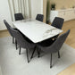 Perspectiva derecha del comedor Ambienta DT-06-2237 con mesa rectangular 156×86×76 cm efecto mármol blanco y seis sillas gris oscuro con patas negras.