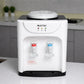 Dispensador de agua Lotus LT-463 sobremesa blanco y negro, frío y caliente, vista frontal en cocina, dos grifos rojo y azul; 36x27x24 cm