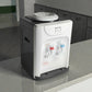 Dispensador de agua Lotus LT-463 frío/caliente tipo sobremesa, frente blanco y laterales negros, vista lateral 3/4 con bandeja antigoteo y dos grifos; 36x27x24 cm