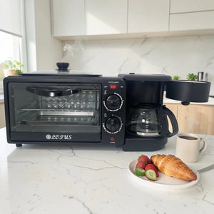 Estación de desayuno LOTUS LT-2317 negra con horno, cafetera y compartimento superior abierto en cocina moderna con desayuno servido.