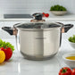 Cacerola mediana Hoffavorer 20 cm (3.9 L) en acero inoxidable plateado con tapa de vidrio, asas negras y aro dorado en la perilla; fondo térmico.
