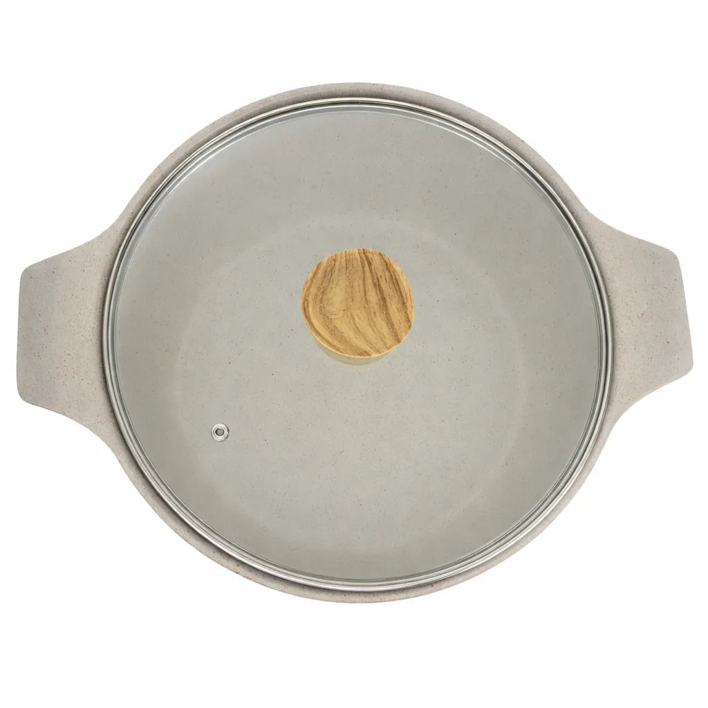 Tapa de vidrio templado para olla HotChef con aro metálico y perilla tipo madera, vista superior centrada sobre fondo blanco.