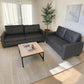 Juego de sofá 3+2 SF-711-GREY en cuero sintético gris oscuro, colocado en sala moderna con mesa de centro, alfombra beige y vista superior en ambiente iluminado.