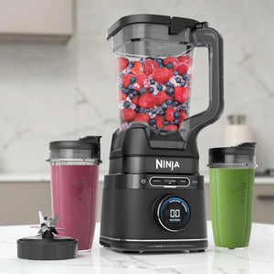 Licuadora Ninja TB301 BlendSense Power Blender Duo Pro color negro con jarra grande de 72 onzas, dos vasos individuales de 24 onzas y cuchilla Hybrid Edge sobre encimera de cocina.