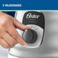 Detalle de la perilla ergonómica de 3 velocidades de la licuadora Oster Classic BLST4655 cromada.