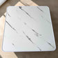 Vista superior de mesa plegable multiusos Ambienta Home Decor color blanco tipo mármol de 60x60 cm con vetas grises y borde blanco, SKU 41346.