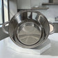 Interior de olla Epicure de acero inoxidable de 5 litros con marcas medidoras internas, asas laterales y acabado brillante.