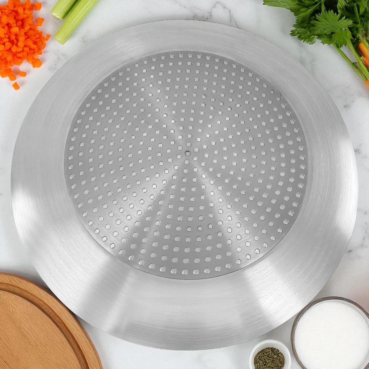 Rejilla de cocción incluida con la olla de presión Sankey de 22 litros, fabricada en aluminio con perforaciones para mejor distribución del calor.