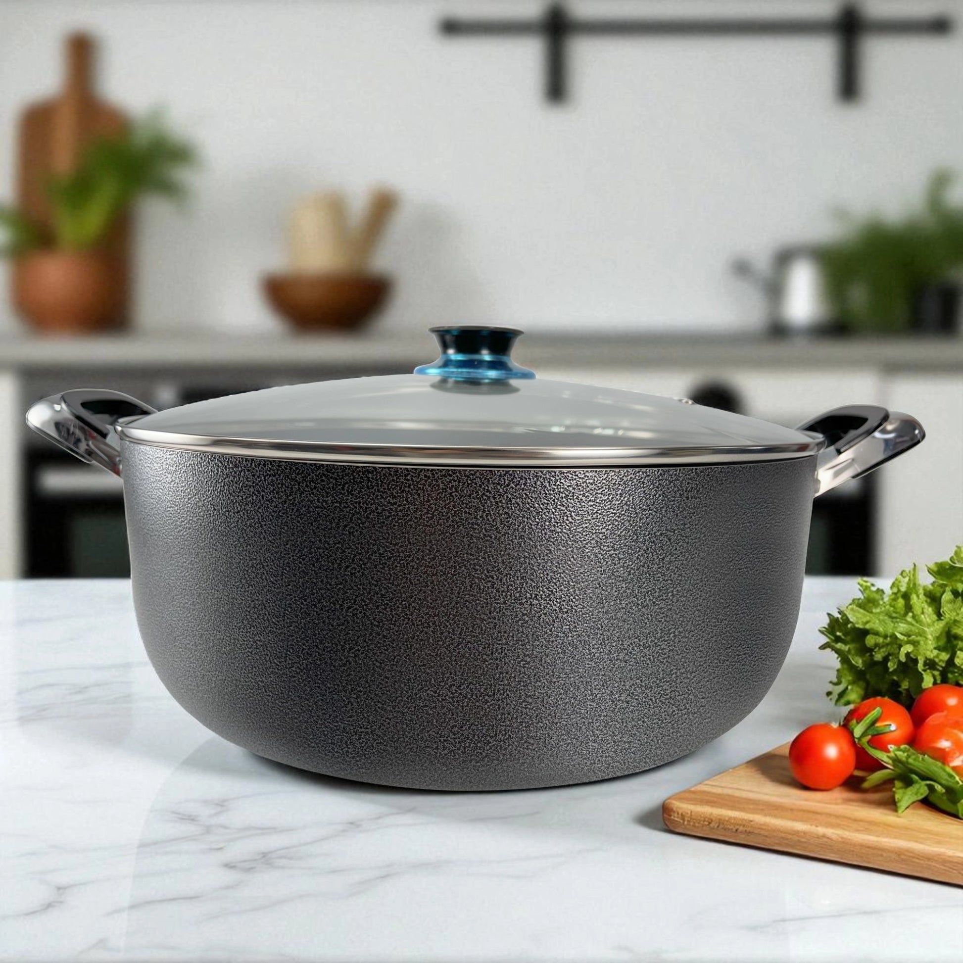 Olla antiadherente ROCA con exterior de granito color negro, tapa de vidrio templado y asas Bake-lite, tamaño 38x16 cm, vista frontal sobre mesa de cocina.