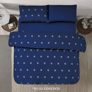 Sábanas Dania Coco en azul marino con estampado de puntos blancos, diseño minimalista, vista superior