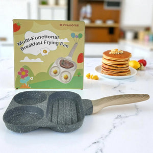 Sartén multifuncional Synmore de granito, 3 secciones, 19x19 cm color gris con mango efecto madera, vista frontal con caja.