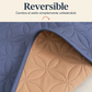 Primer plano del borde reversible Metz con sus lados azul grisáceo y durazno.
