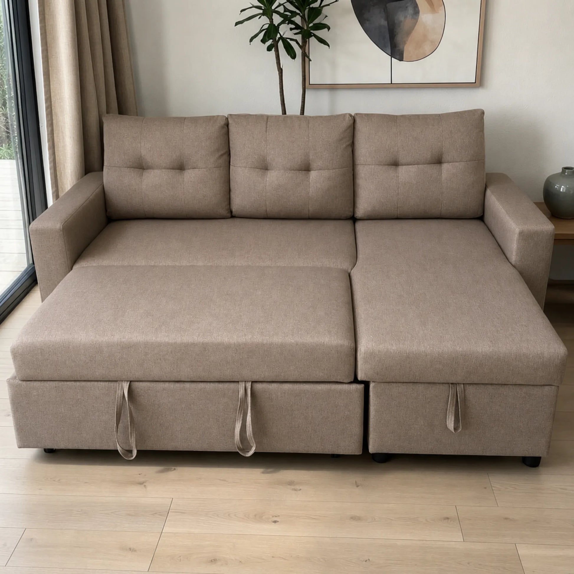 Sofá cama 2 en 1 Ambienta Home Decor color taupe completamente extendido en modo cama, con superficie amplia, chaise derecha y respaldos acolchados.