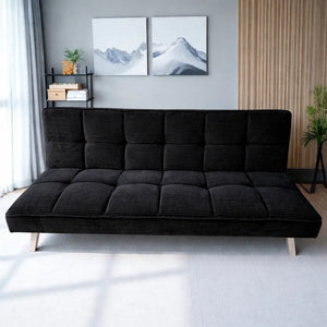 Sofá cama de terciopelo acanalado Negro con patas metálicas, vista frontal en sala, marca Ambienta Home Decor, medidas 175×75×55 cm